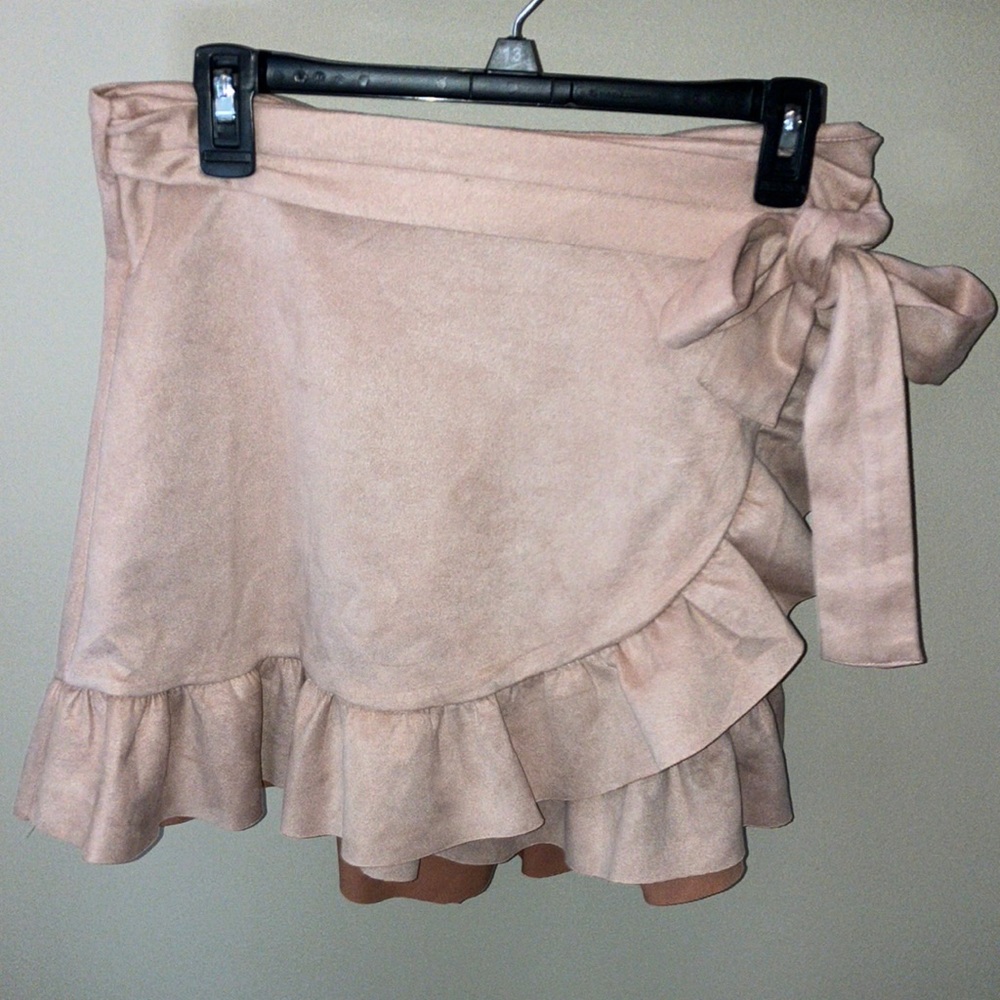 Pink wrap around skirt.  Suede material.  Never worn.